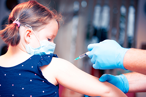 child getting vaccinated